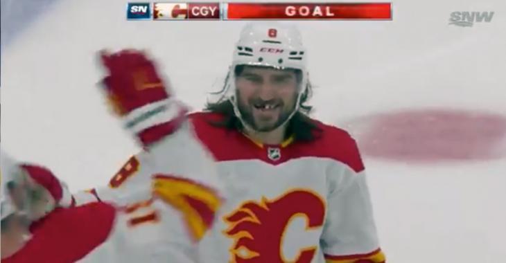 Chris Tanev scores his first goal with the Flames... from his own blueline