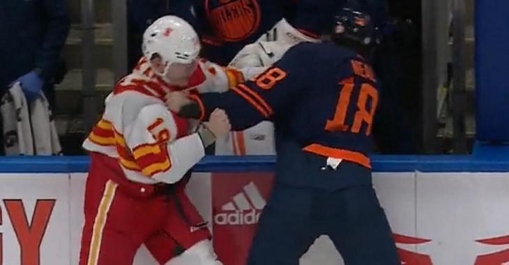 Matthew Tkachuk and James Neal drop the gloves in the Battle of Alberta.